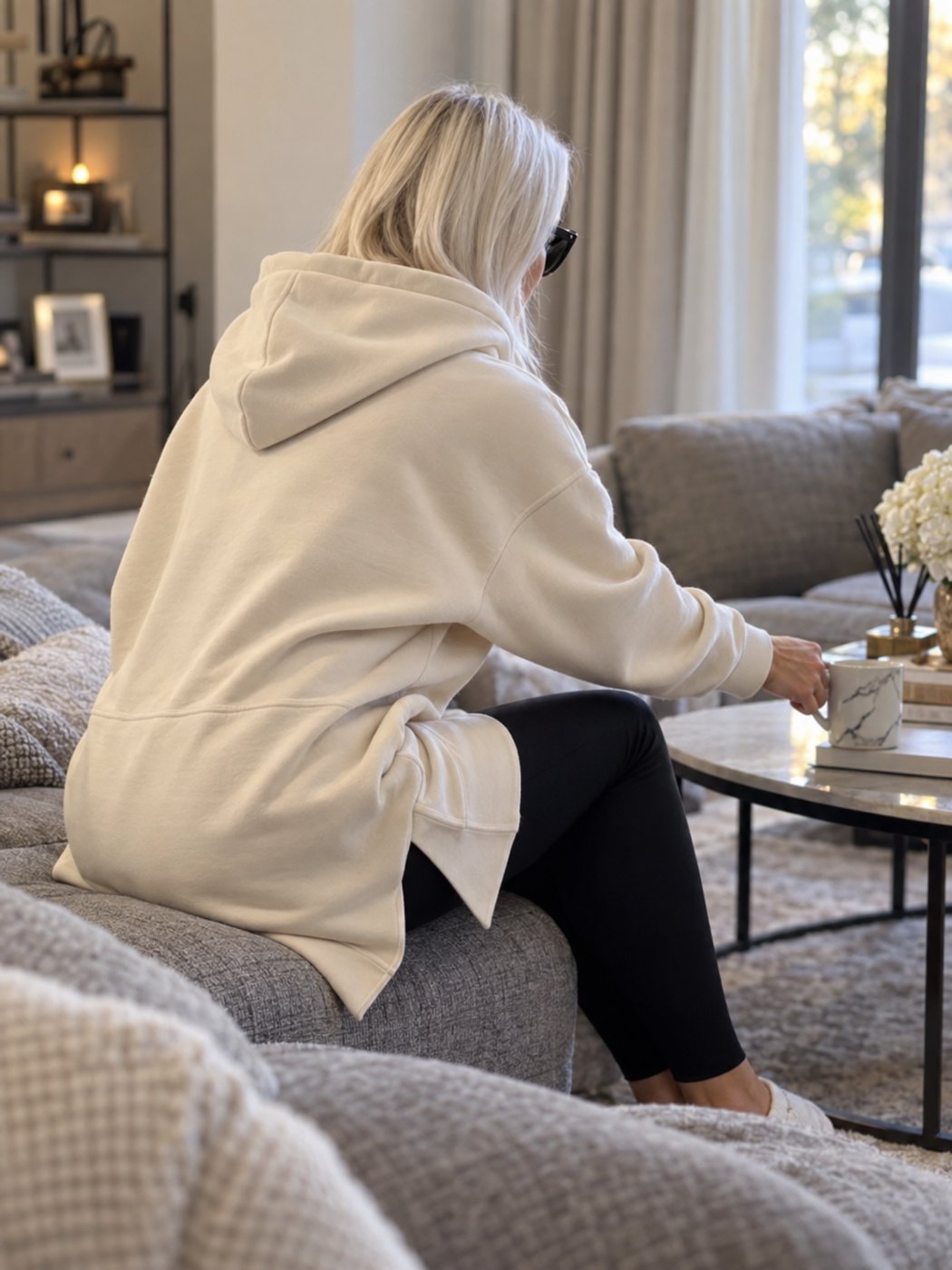 Warmy hoodie worn with tights and boots